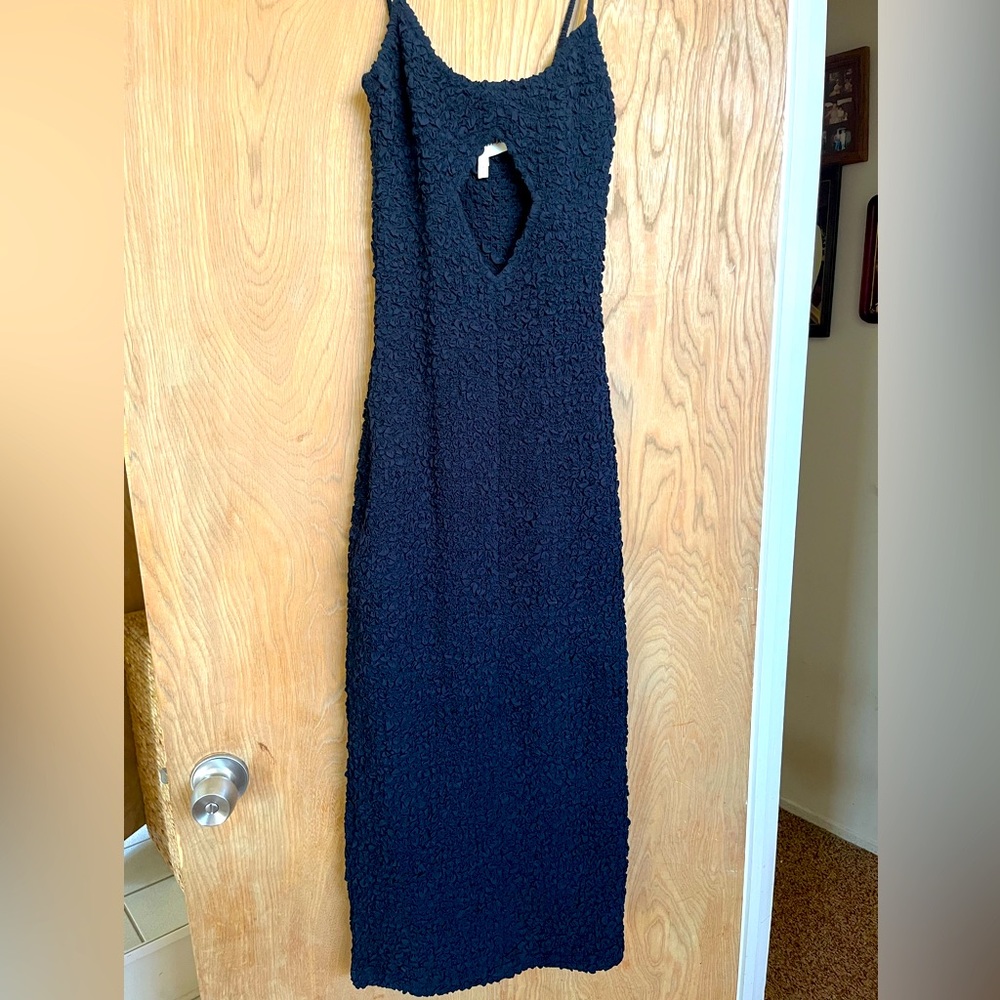 Mara Hoffman crinkle dress in navy blue.